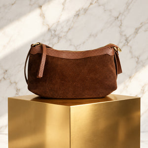 THE ARC SUEDE CROSSBODY BAG , TAN